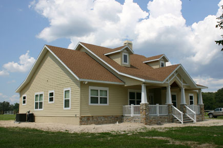 High Springs Architect, country home design with raised front porch, split pitch roof and dormers