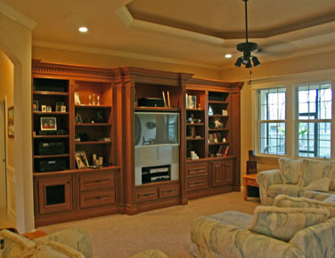 Architectural Designers, living room built-in entertainment center designed by florida architect
